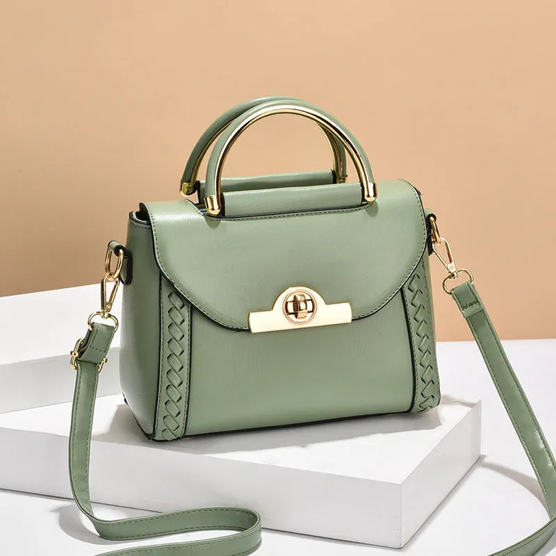 Women's PU leather crossbody messenger bag with double connector strap, soft handle, horizontal square shape, sold in black white or green