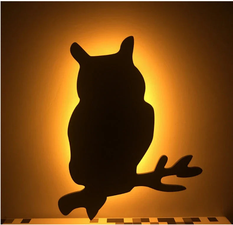 A stylish cat-themed LED lamp that automatically lights up when it detects sound, creating a cozy, ambient glow in a room.