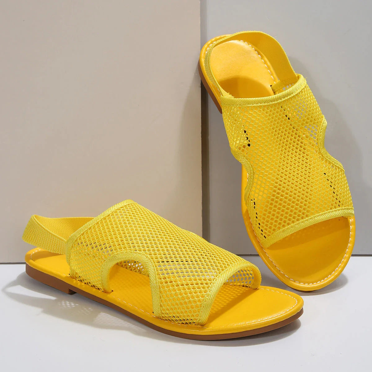Breathable mesh sandals in various colors and styles for comfortable summer wear