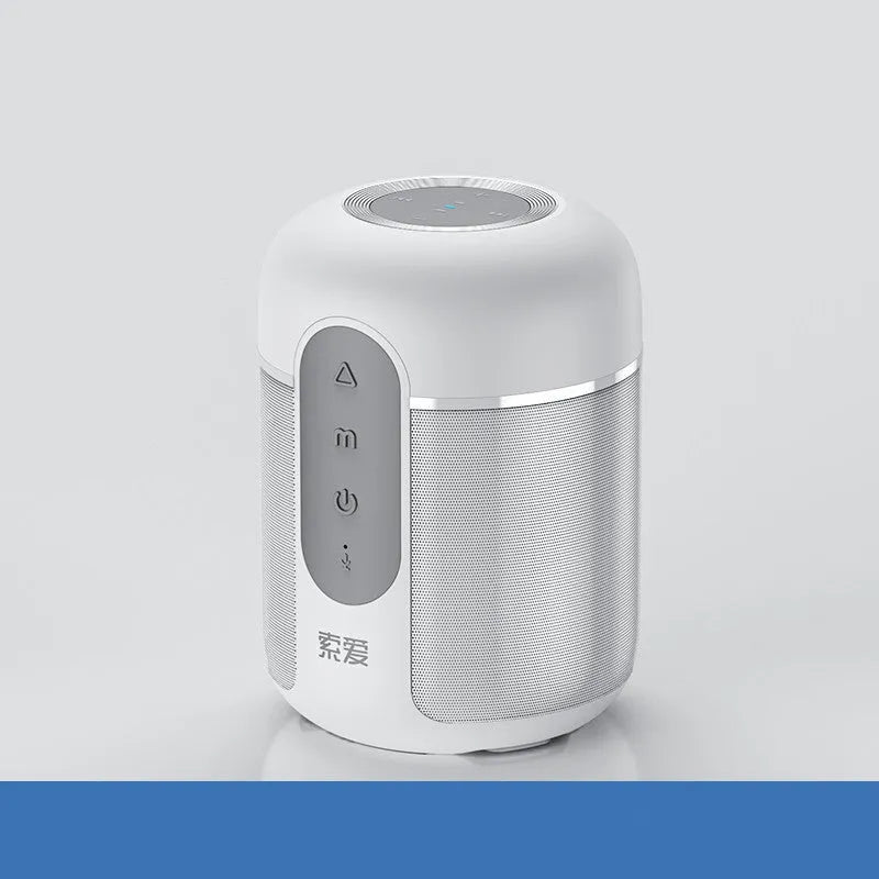 Compact black portable Bluetooth speaker with 30W output and 1500mAh battery, shown on a table.
