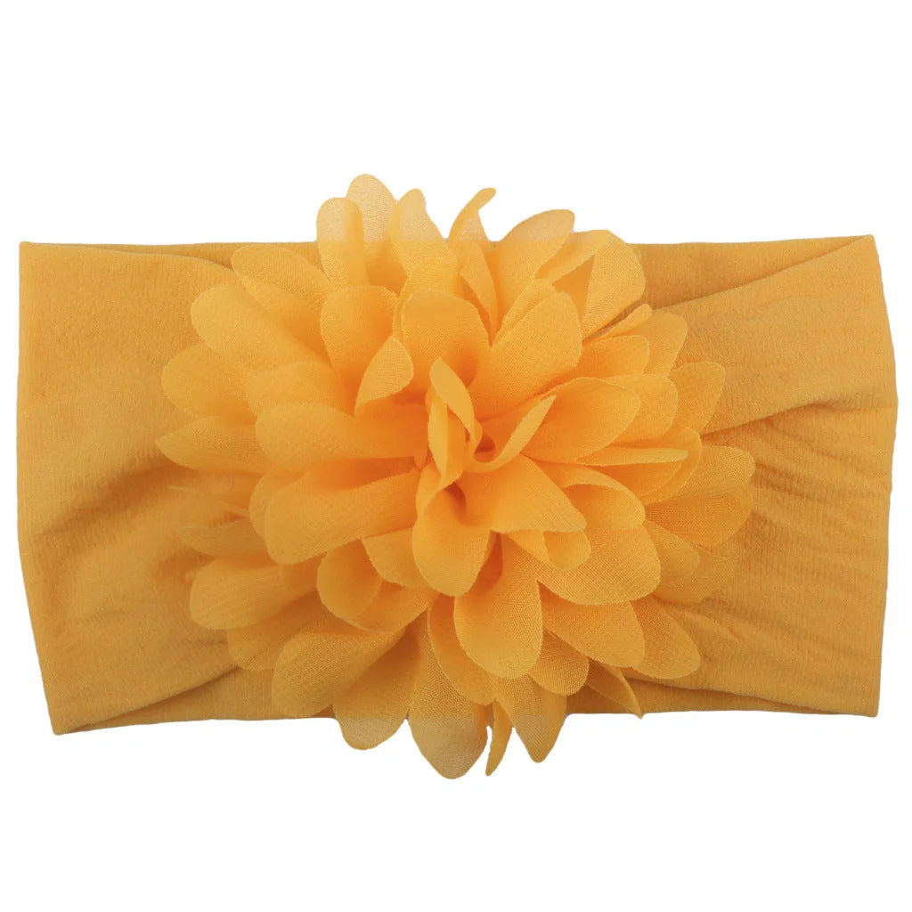 Handcrafted chiffon flower baby headband for little princesses, available in various colours and styles.