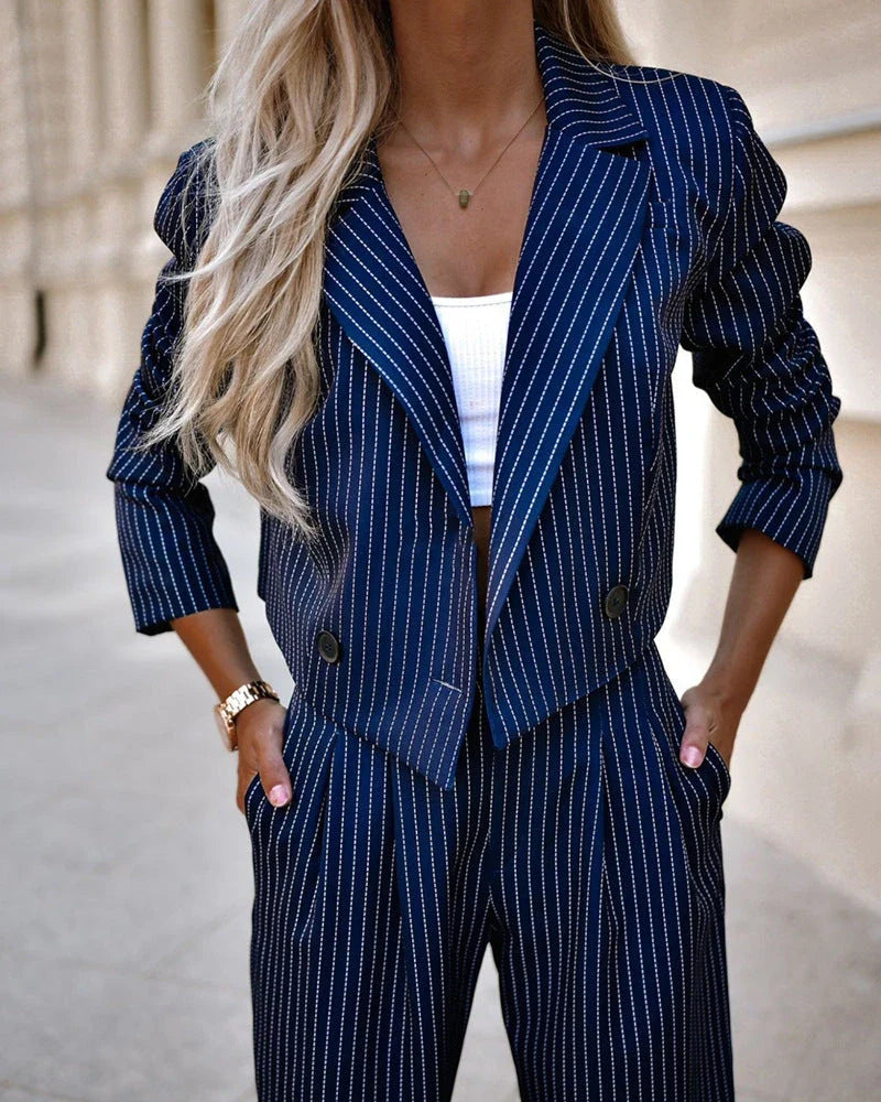 Stylish striped two-piece outfit featuring a cropped top and straight-leg pants in a variety of colors