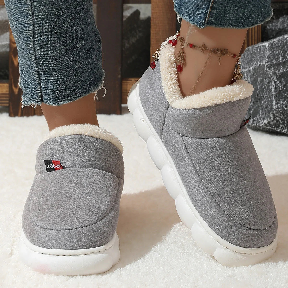 Cosy velvet house slippers for men and women, featuring plush velvet upper, suede lining, and durable rubber soles