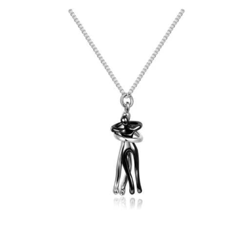Stylish embracing pendant necklace in various colors, including rose gold, white black, black gold, and more. Minimalist design with a delicate chain.