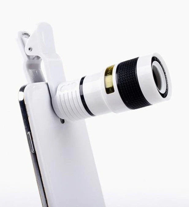 A close-up photograph of a telescope lens attached to a smartphone, capturing a distant subject with impressive clarity and detail.