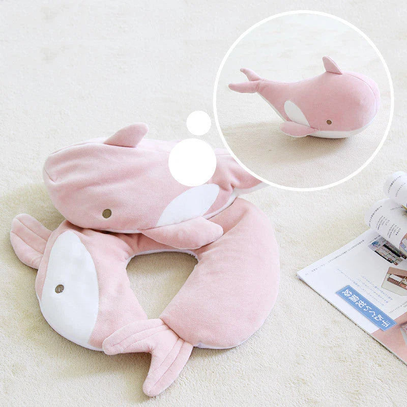 A soft and cozy penguin-shaped neck pillow with a unique U-shaped design for customized neck and shoulder support.