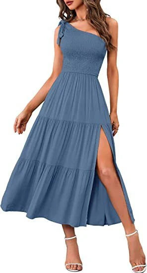 Elegant one-shoulder pleated maxi dress in various colours, featuring an asymmetrical hem and side slits for a stylish, head-turning look