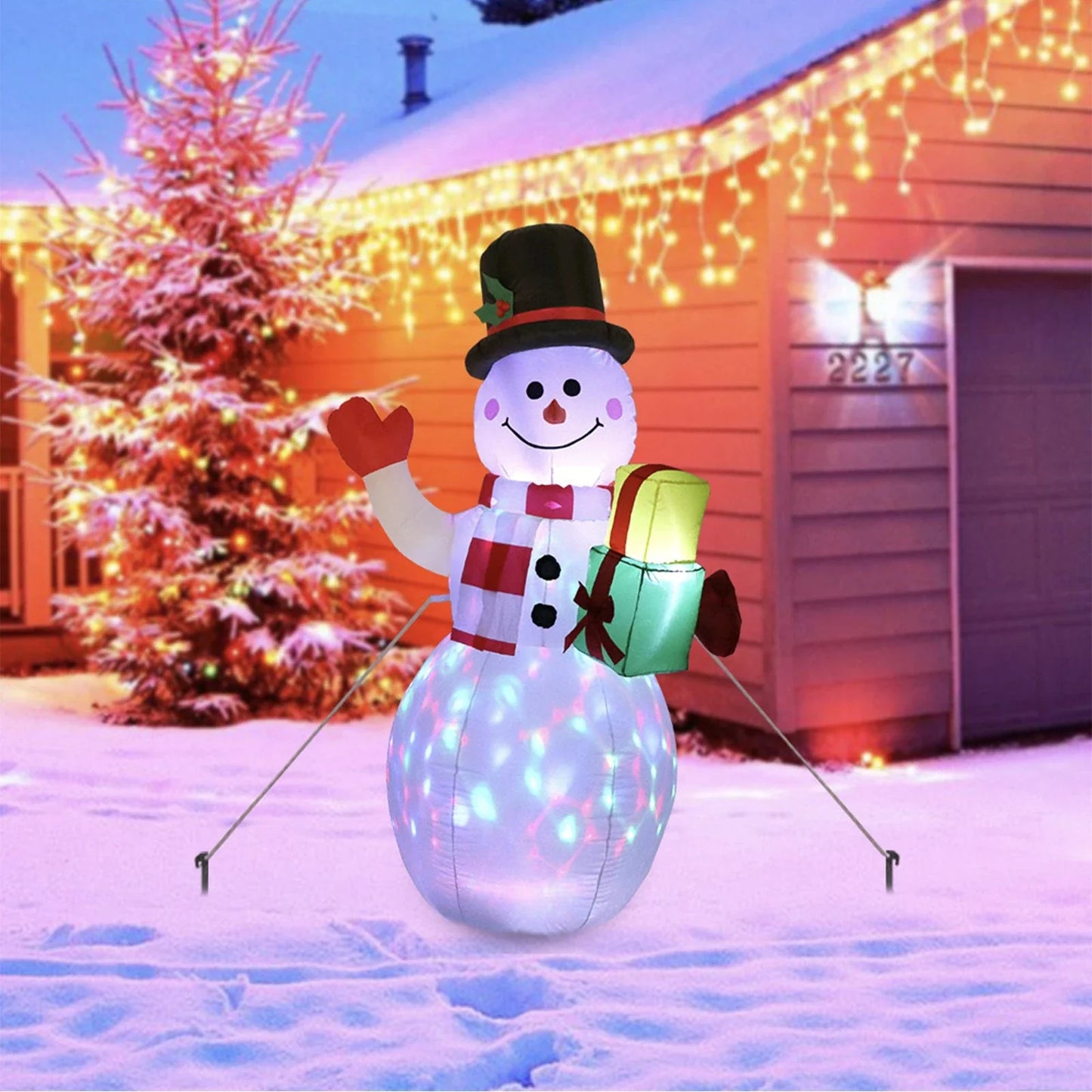 Glowing Christmas inflatables with Santa, snowman, Christmas tree, and gingerbread man designs