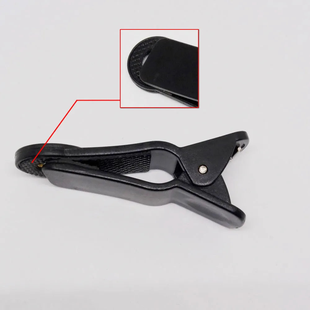 12x telescopic zoom lens with universal collar clip for attaching to a mobile phone.