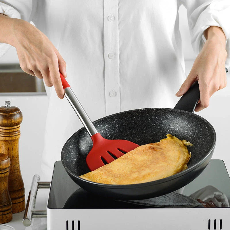 Premium silicone kitchenware set with stainless steel handles in black and red colors, including various cooking utensils and tools
