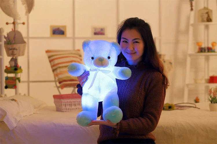 Illuminating plush teddy bear with color-changing LED lights, soft and huggable design in various sizes and colors