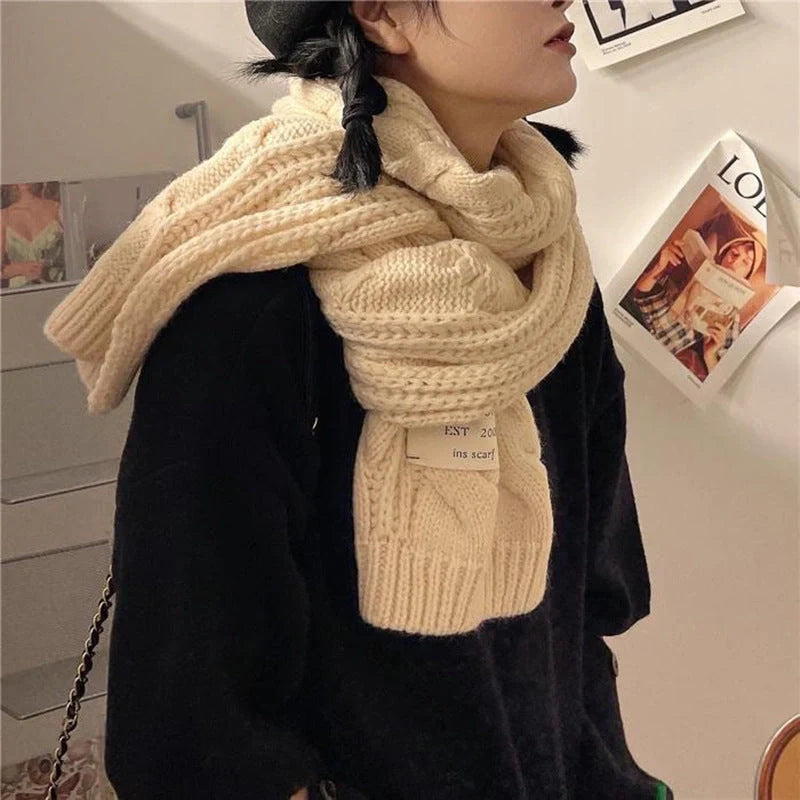 Soft, velvety Apricot Scarf with elegant patterns, perfect for keeping warm during the British winter