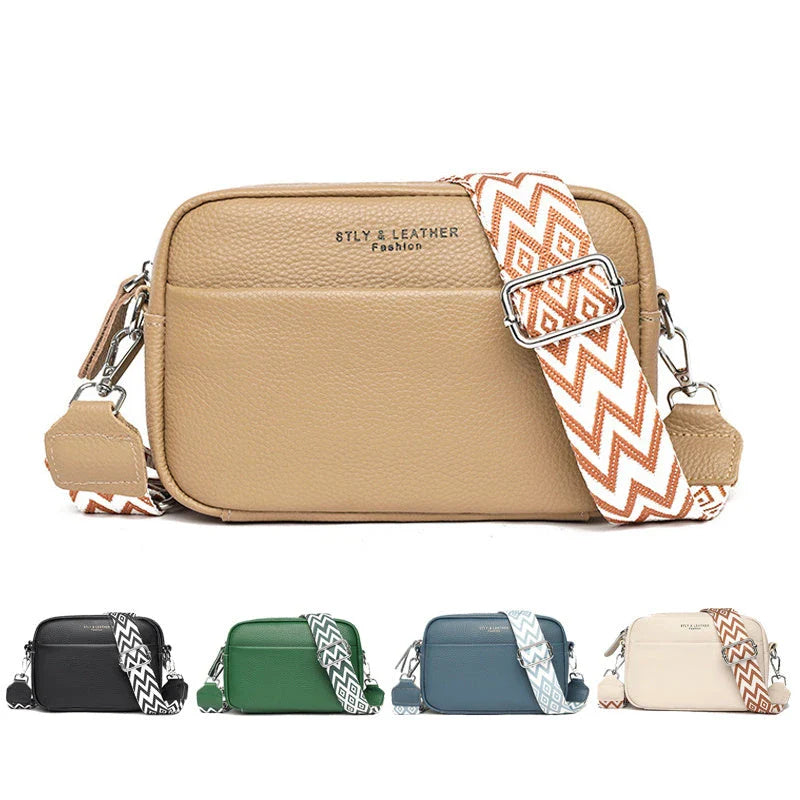 Stylish crossbody bag with rhombus embroidery, wide adjustable shoulder strap, and multiple interior pockets in various color options