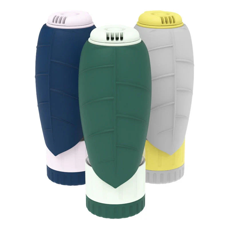 Multifunction pet water bottle with collapsible feeding bowl in green, grey, and blue colors for hydrating and feeding pets during travel and outdoor activities