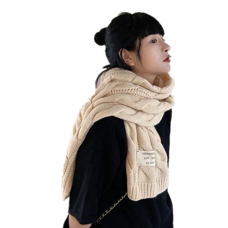 Soft, velvety Apricot Scarf with elegant patterns, perfect for keeping warm during the British winter