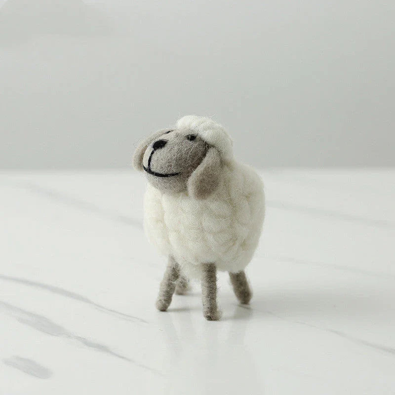 Plush sheep figurines in various colors and sizes, perfect for home decoration and gifting
