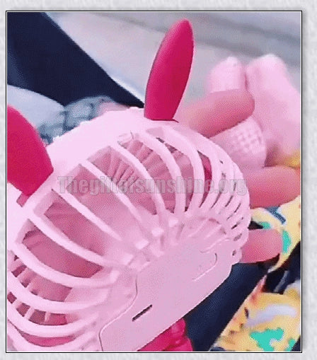 A rechargeable stroller fan with a flexible tripod and adjustable airflow settings, perfect for keeping babies cool during summer outings.