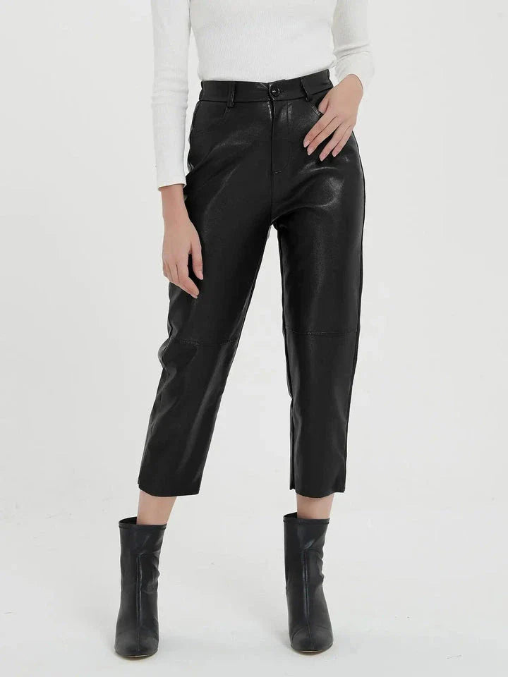 Elegant faux leather pants with high waist and ankle-length design, perfect for office or casual wear.