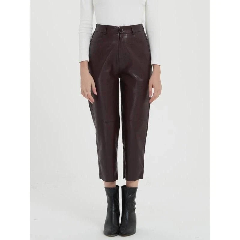 Elegant faux leather pants with high waist and ankle-length design, perfect for office or casual wear.