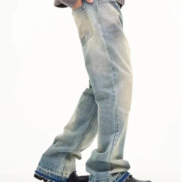 Loose, straight-leg jeans in a light blue, washed-out vintage style for men