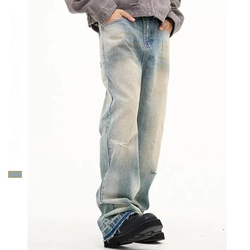 Loose, straight-leg jeans in a light blue, washed-out vintage style for men