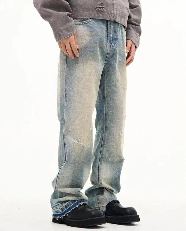 Loose, straight-leg jeans in a light blue, washed-out vintage style for men