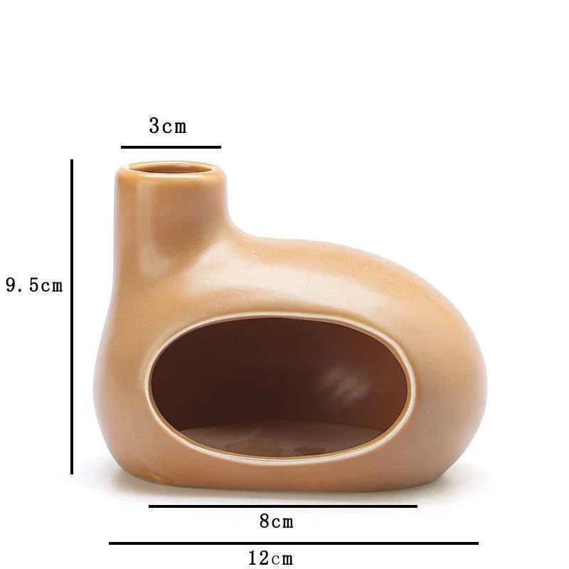 Elegant and modern ceramic incense burner with Palo Santo wood holder, designed to enhance your living space with a calming aroma.
