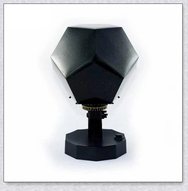 Enchanting star projector lamp casting a mesmerising galaxy display on the walls and ceiling of a bedroom