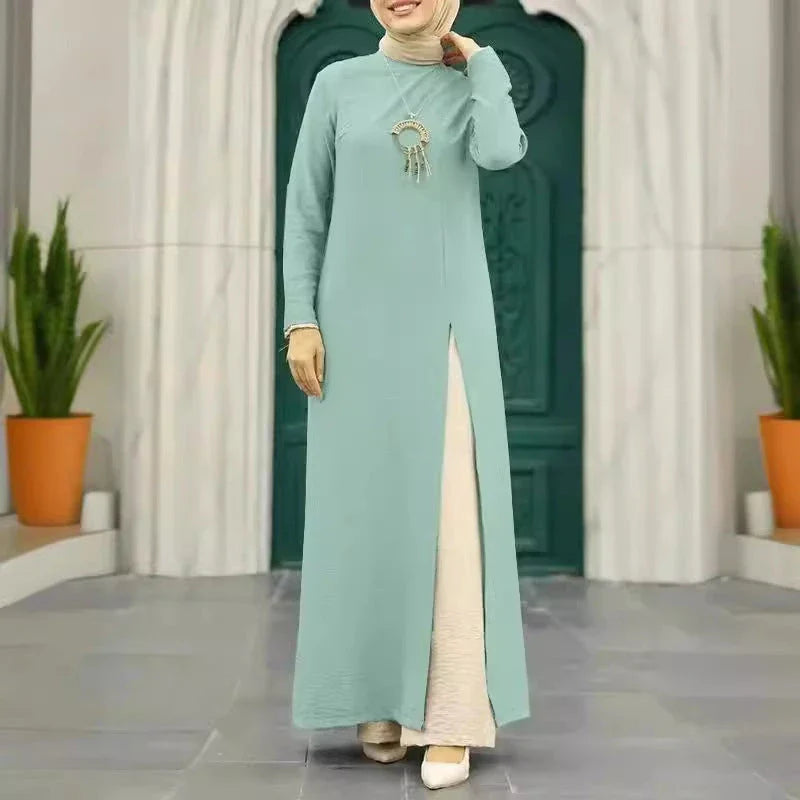 Muslim women's dress made of elegant ice silk fabric with long sleeves and high slit hem, available in various colours