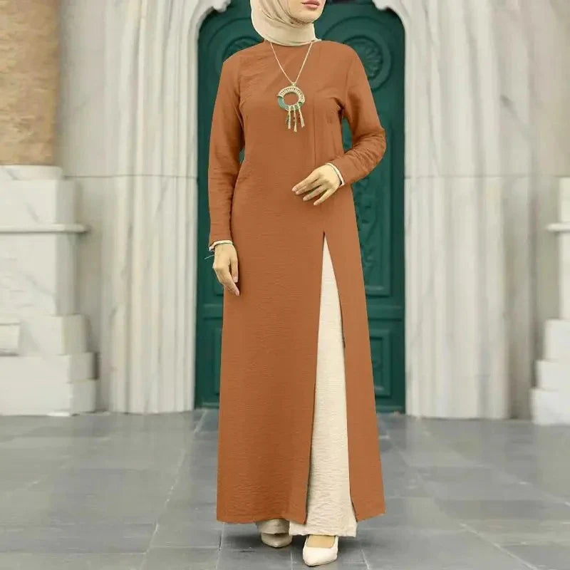 Muslim women's dress made of elegant ice silk fabric with long sleeves and high slit hem, available in various colours
