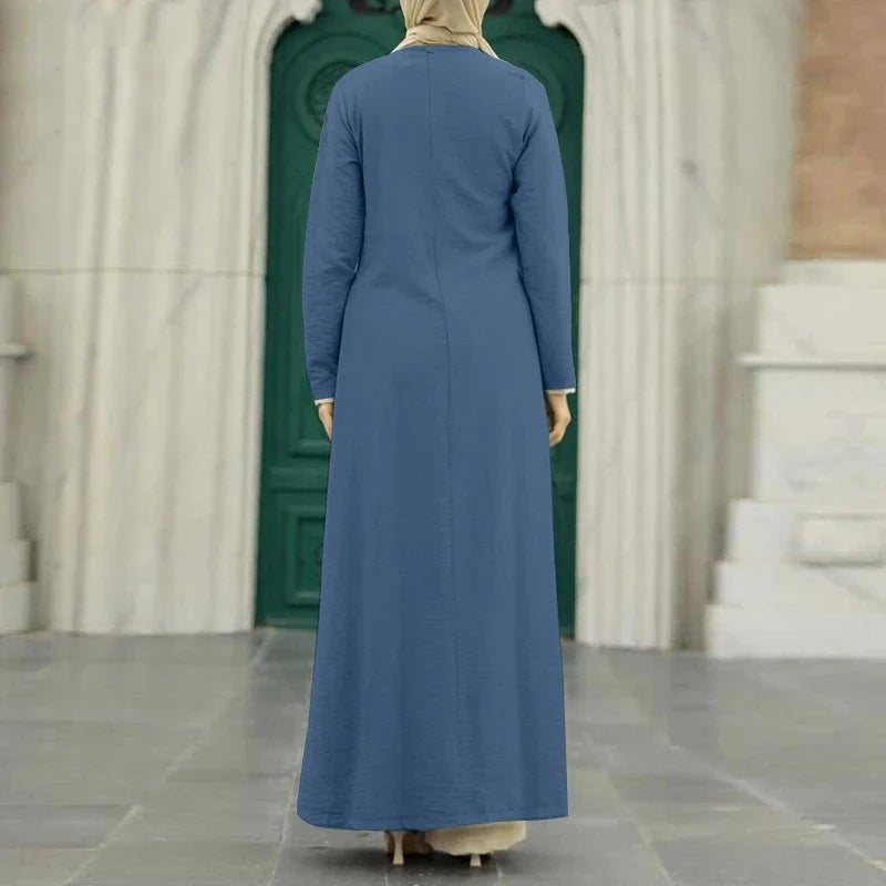 Muslim women's dress made of elegant ice silk fabric with long sleeves and high slit hem, available in various colours