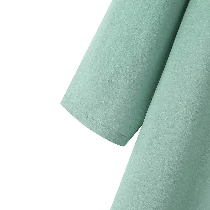 Muslim women's dress made of elegant ice silk fabric with long sleeves and high slit hem, available in various colours