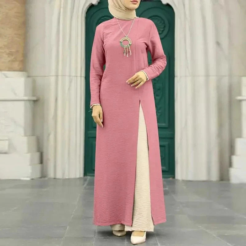 Muslim women's dress made of elegant ice silk fabric with long sleeves and high slit hem, available in various colours