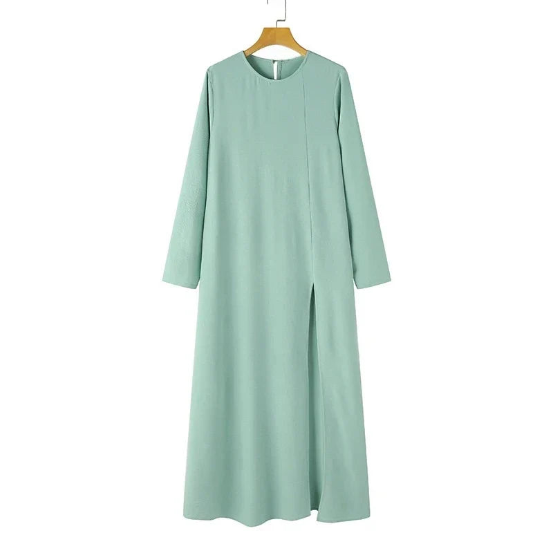Muslim women's dress made of elegant ice silk fabric with long sleeves and high slit hem, available in various colours