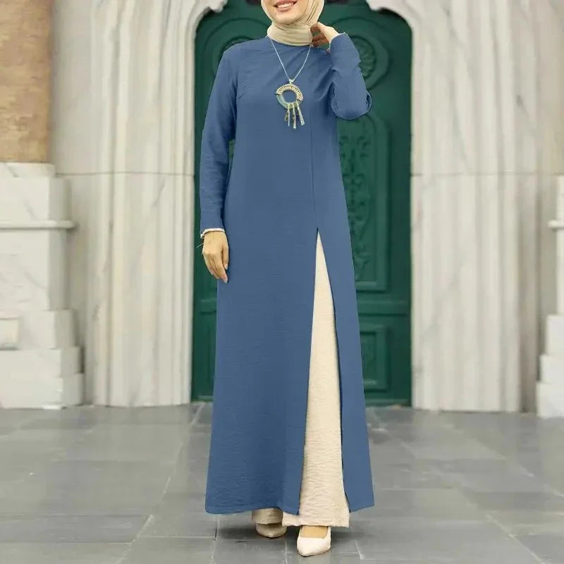 Muslim women's dress made of elegant ice silk fabric with long sleeves and high slit hem, available in various colours