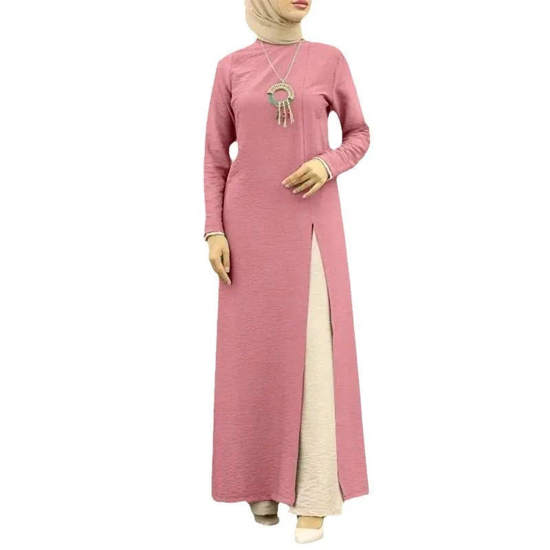 Muslim women's dress made of elegant ice silk fabric with long sleeves and high slit hem, available in various colours