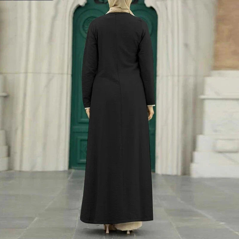Muslim women's dress made of elegant ice silk fabric with long sleeves and high slit hem, available in various colours