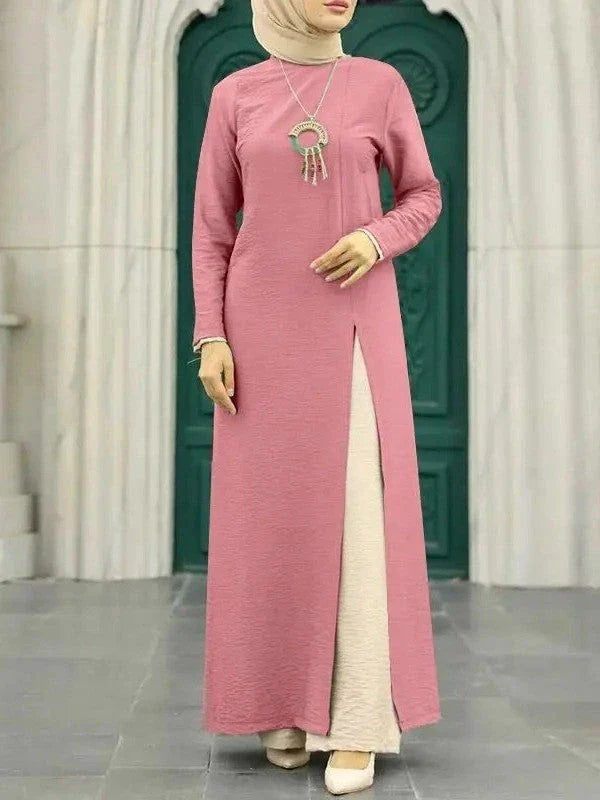 Muslim women's dress made of elegant ice silk fabric with long sleeves and high slit hem, available in various colours