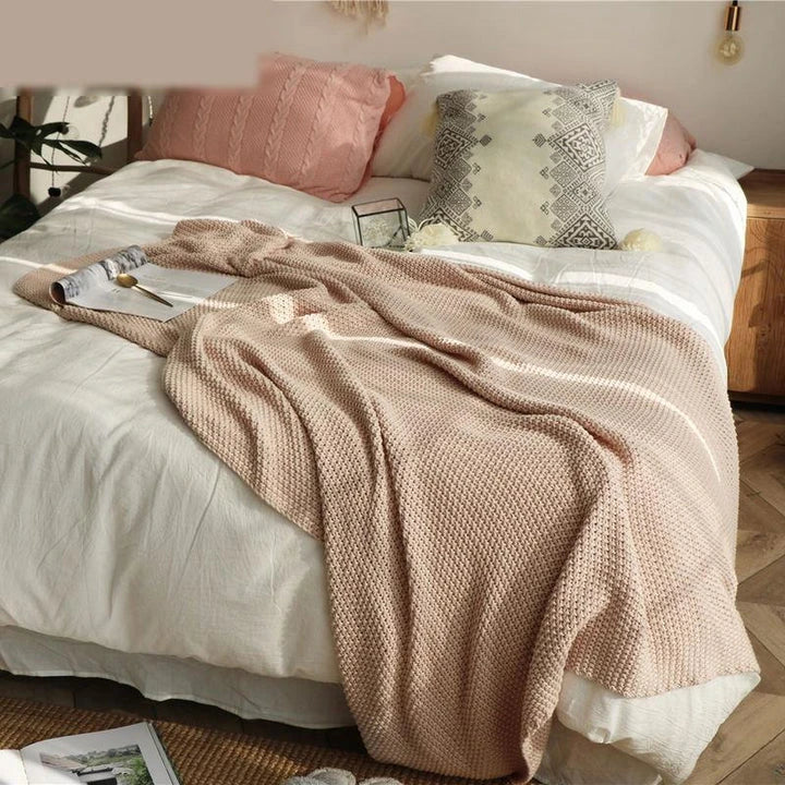 Cosy oversized moss stitch knitted blanket in a variety of elegant colours, perfect for adding comfort and style to your living space.