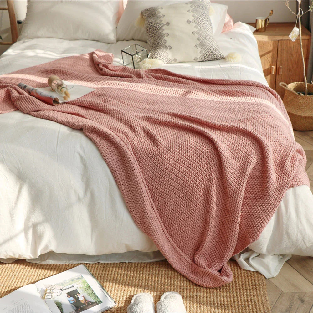 Cosy oversized moss stitch knitted blanket in a variety of elegant colours, perfect for adding comfort and style to your living space.