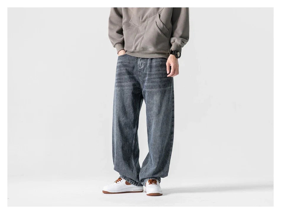 Men's Japanese-inspired retro jeans in black and gray, featuring a mid-waist fit and premium cotton construction for comfort and durability.
