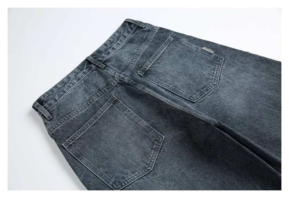 Men's Japanese-inspired retro jeans in black and gray, featuring a mid-waist fit and premium cotton construction for comfort and durability.