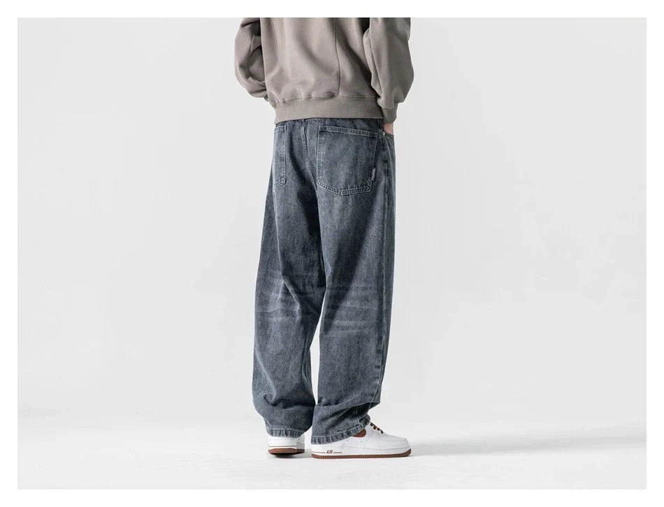Men's Japanese-inspired retro jeans in black and gray, featuring a mid-waist fit and premium cotton construction for comfort and durability.