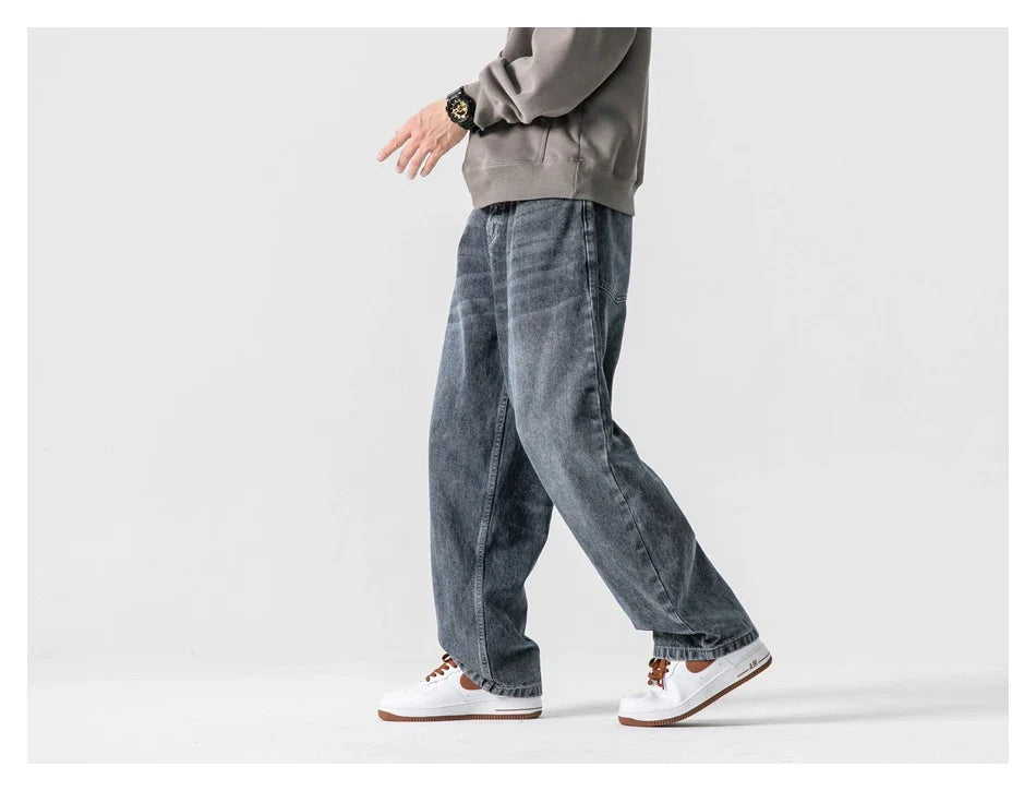 Men's Japanese-inspired retro jeans in black and gray, featuring a mid-waist fit and premium cotton construction for comfort and durability.