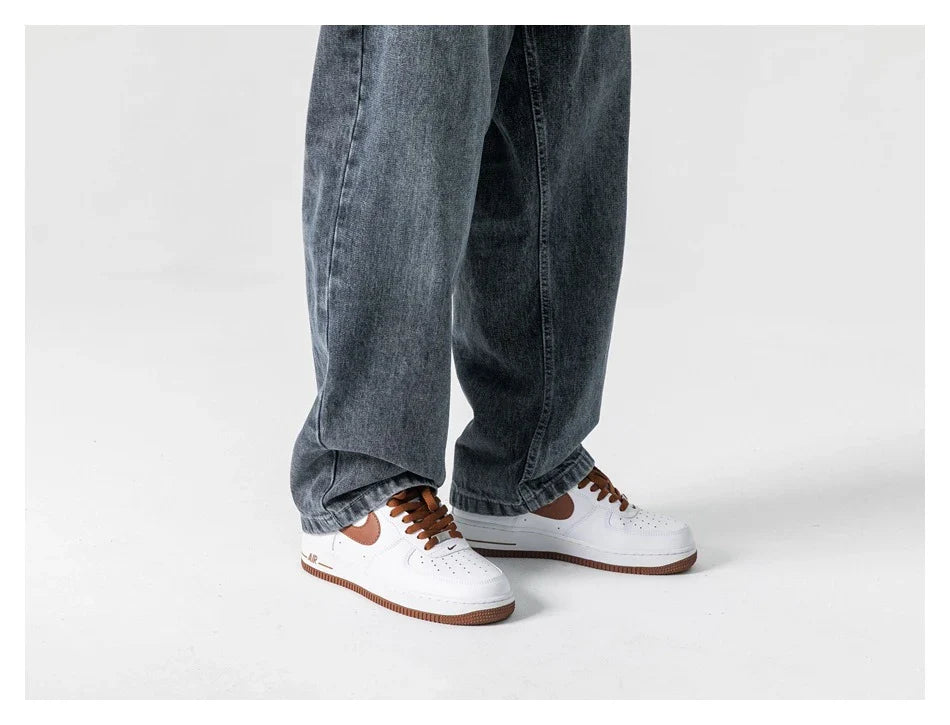 Men's Japanese-inspired retro jeans in black and gray, featuring a mid-waist fit and premium cotton construction for comfort and durability.