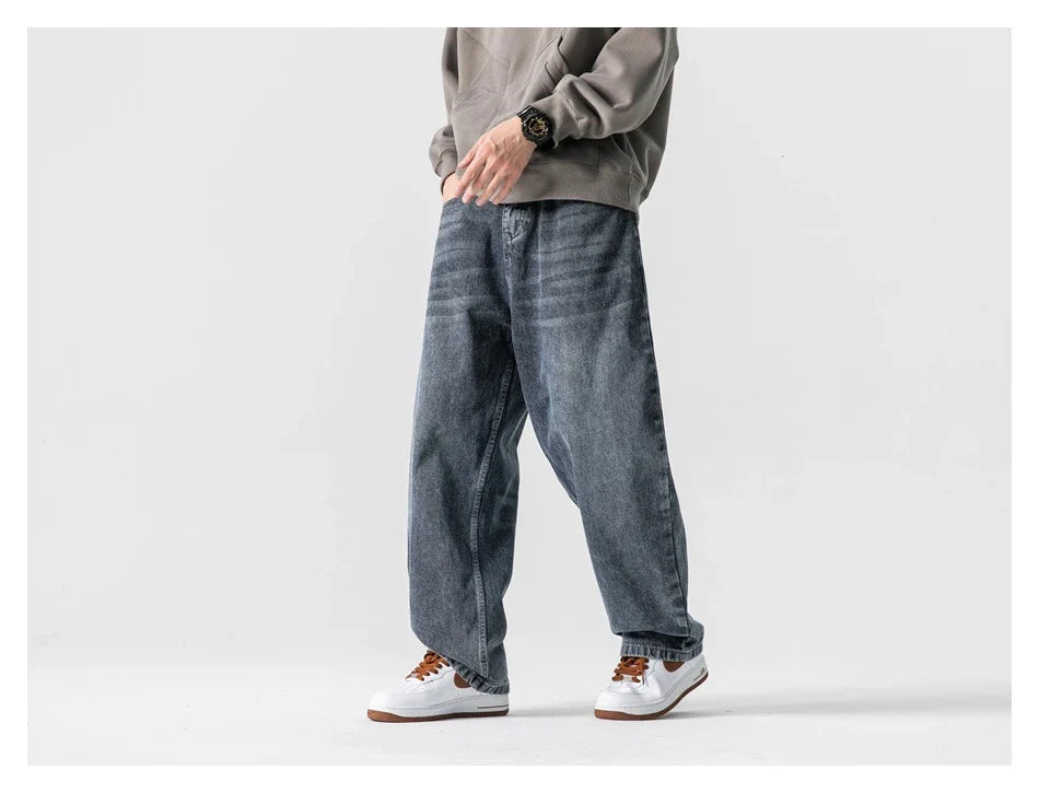 Men's Japanese-inspired retro jeans in black and gray, featuring a mid-waist fit and premium cotton construction for comfort and durability.
