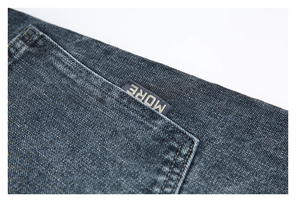 Men's Japanese-inspired retro jeans in black and gray, featuring a mid-waist fit and premium cotton construction for comfort and durability.