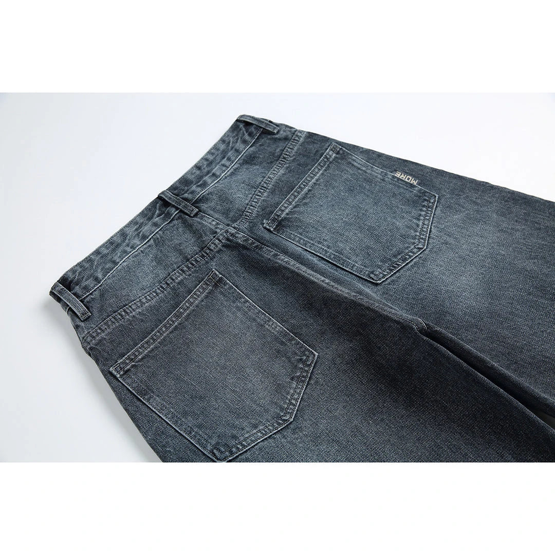 Men's Japanese-inspired retro jeans in black and gray, featuring a mid-waist fit and premium cotton construction for comfort and durability.