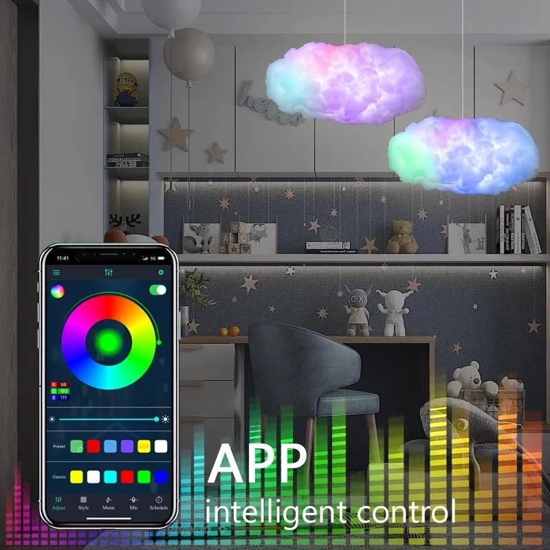 White fabric cloud shaped light hanging from ceiling with multi-coloured LED glow.