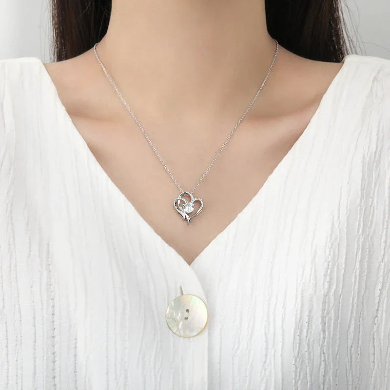 Heart-shaped pendant necklace with sparkling rhinestones, a stylish and elegant accessory for women